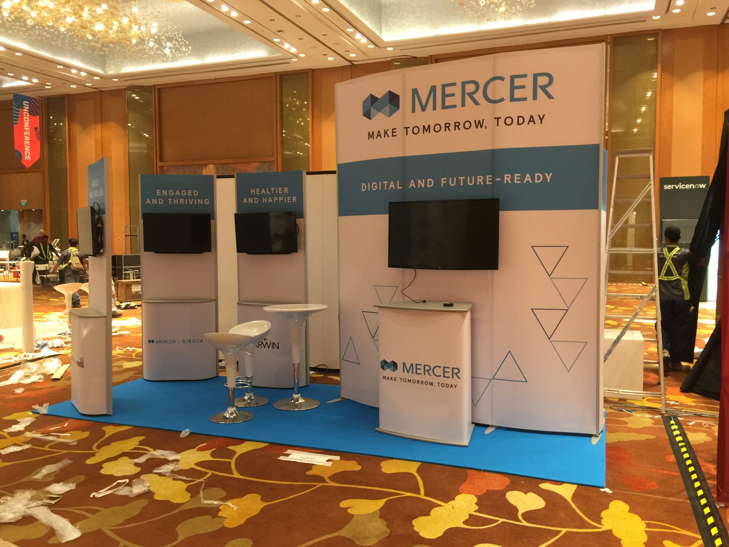 How Display Systems & Prints Turned Mercer’s Compact Booth into a Multi-Engagement Experience
